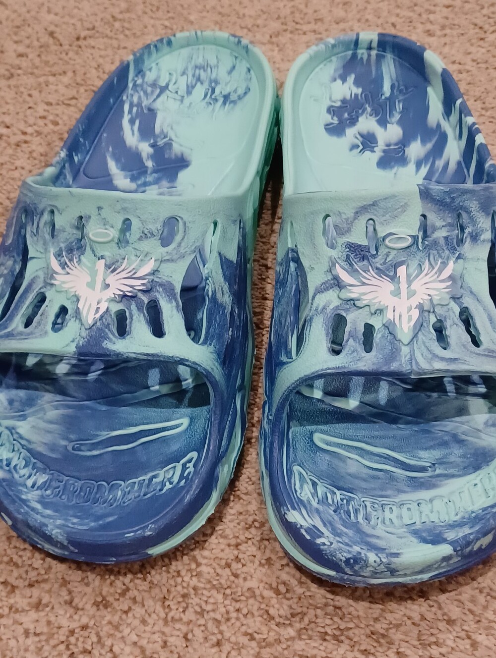 PUMA x LaMelo Ball MB.03 slides in the "Electric Peppermint" colorway.